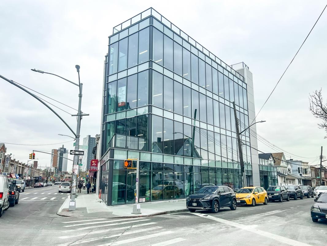 F50 curtain wall system aluminum facade installation modern commercial building Avrams AWDI