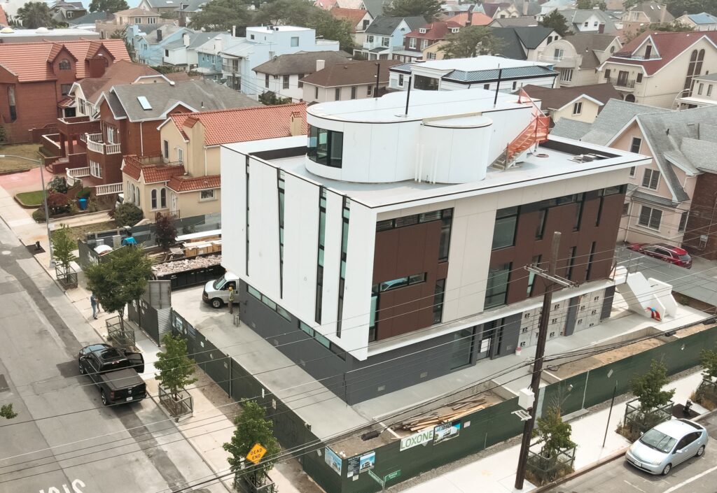 Avrams oceanfront home in Manhattan Beach Brooklyn with aluminum windows, sliding doors, and modern glass systems