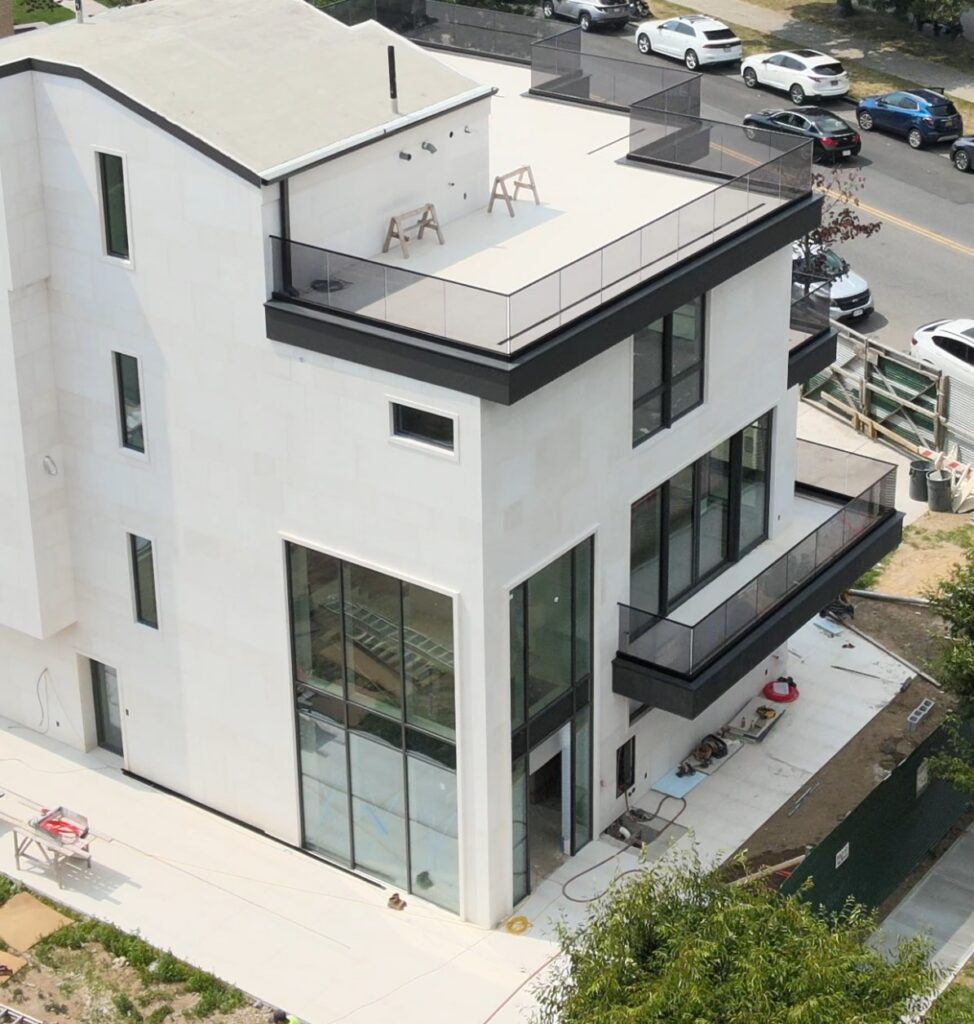 Avrams Windows and Doors private Brooklyn home with aluminum windows, sliding doors, curtain wall glazing, and large glass openings